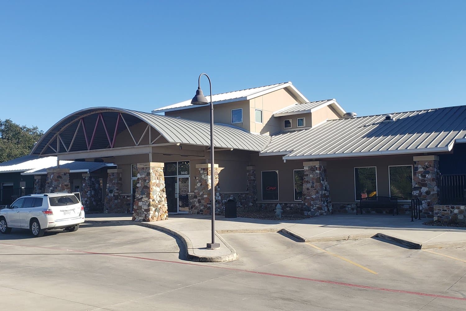 Front exterior view of The Wagmore Pet Resort building from the parking lot in Boerne, TX.